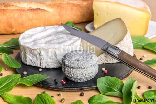Platter of assorted french cheese with baguette Platter of assorted french cheese with baguette